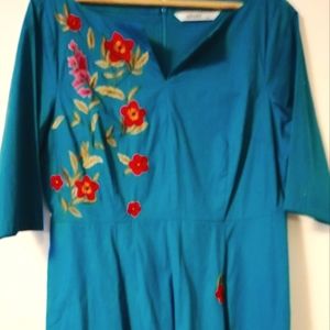 Lightweight blue dress with real flower embroidery and pockets